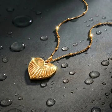 Ribbed heart locket pendant in gold on dark slate